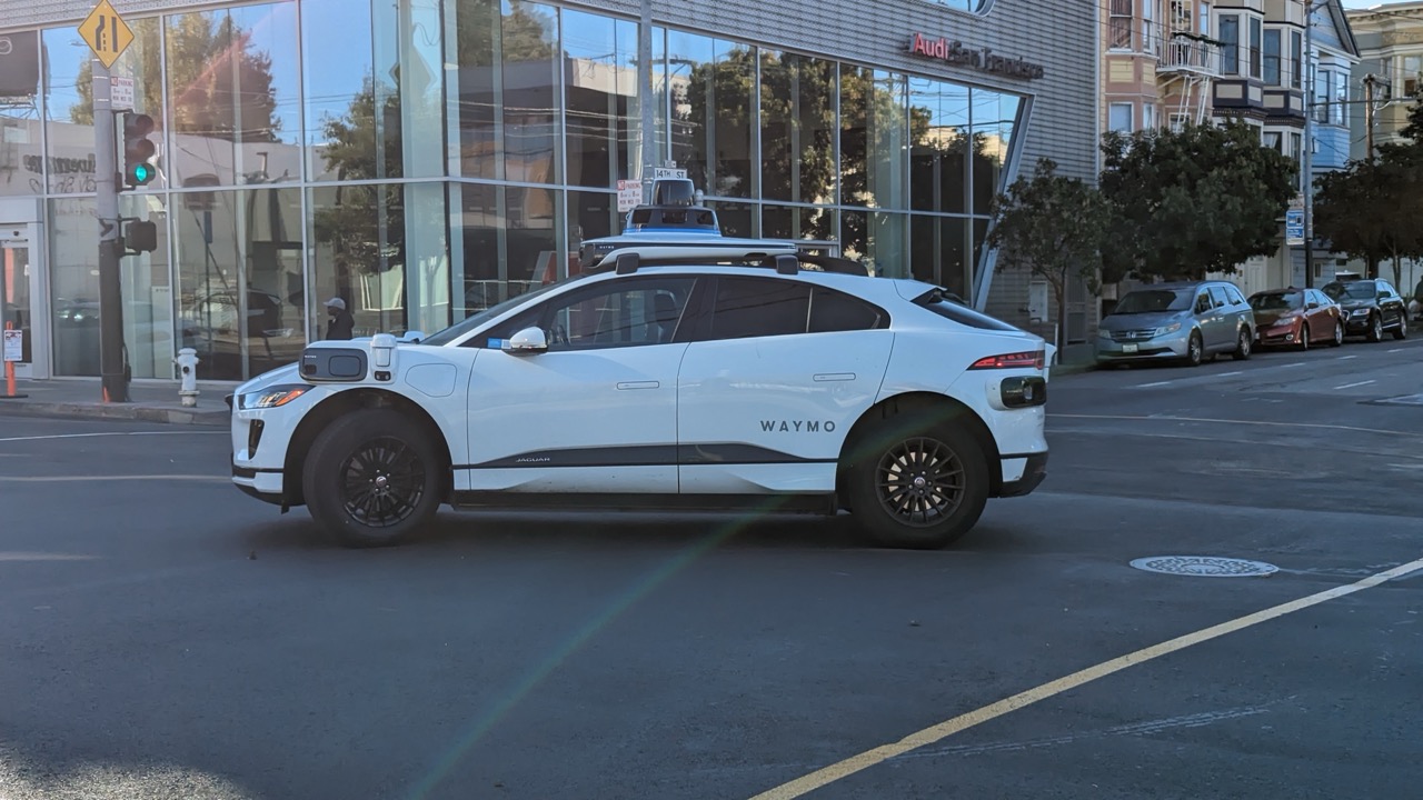 Waymo vehicles parked on a San Francisco street